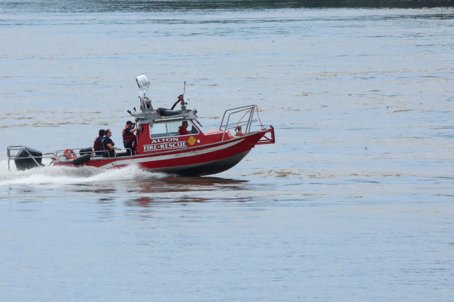 Helicopter crashes into barge on Mississippi River